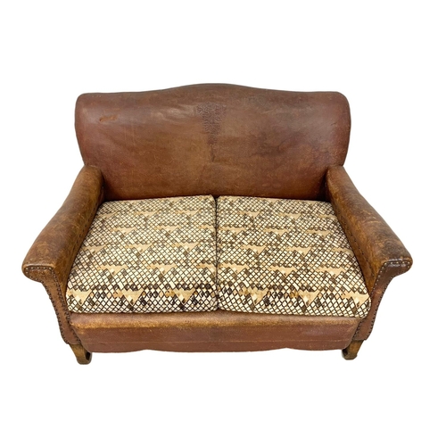 797 - Early 20th Century leather club sofa with original leather, circa 1930. 124x80x80cm