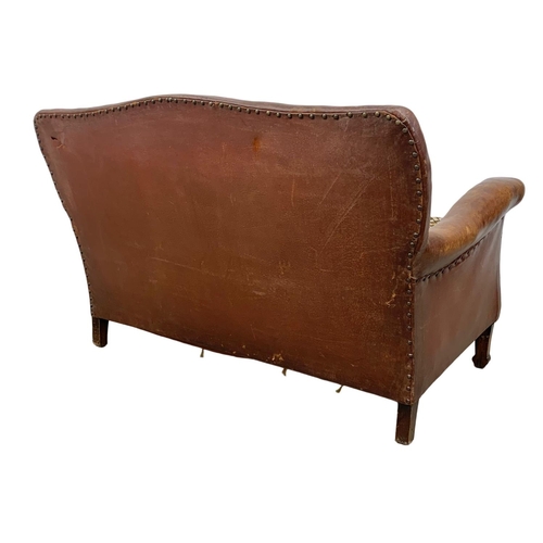 797 - Early 20th Century leather club sofa with original leather, circa 1930. 124x80x80cm