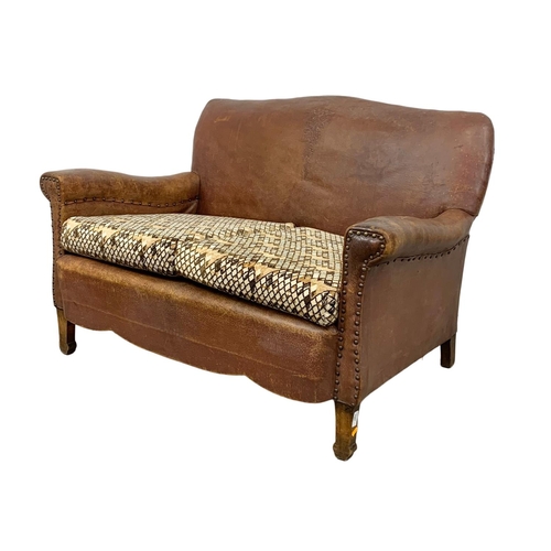 797 - Early 20th Century leather club sofa with original leather, circa 1930. 124x80x80cm