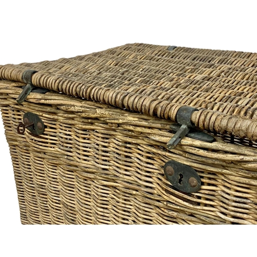 80 - A large Edwardian wicker basket with lock and key, 75cm x 54cm x 52cm