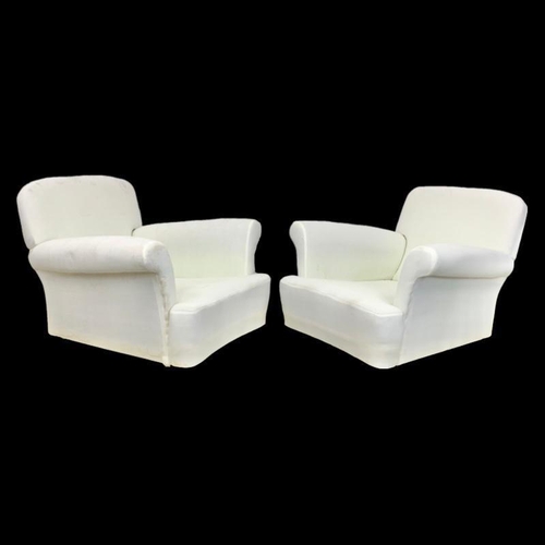 801 - A pair of vintage club armchairs. 89cm x 90cm x 72cm