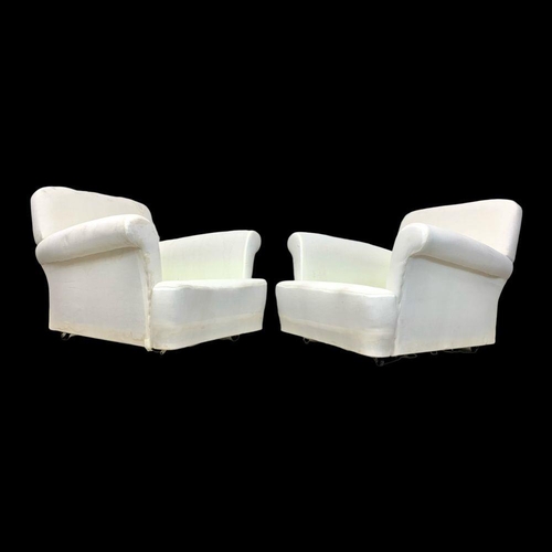 801 - A pair of vintage club armchairs. 89cm x 90cm x 72cm