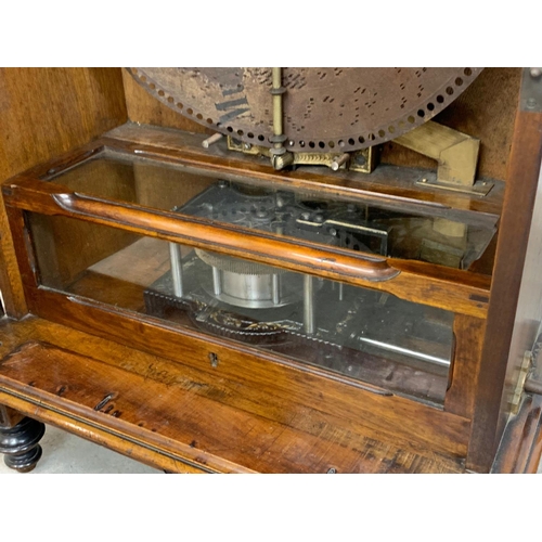 803 - A large 19th century Penny in the Slot polyphon with approx. 65 discs. 70cm x 40cm x 125cm