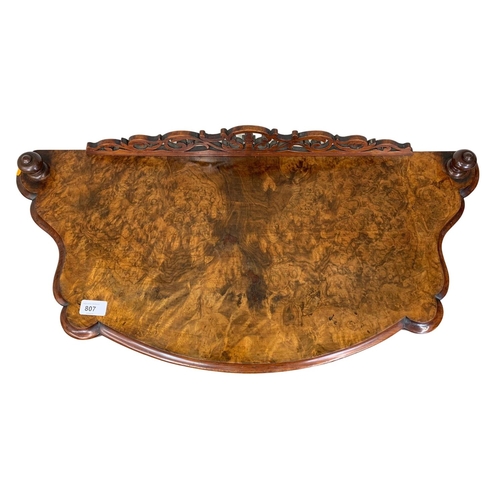 807 - A Victorian burr walnut Canterbury whatnot, 1860s. 77cm x 36cm x 92cm