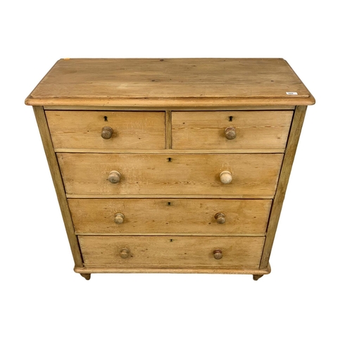 809 - A tall Victorian pine chest of drawers, 105cm x 43cm x 101cm