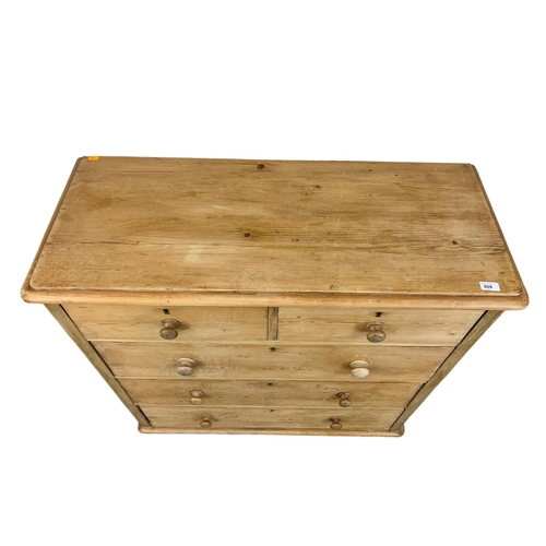 809 - A tall Victorian pine chest of drawers, 105cm x 43cm x 101cm