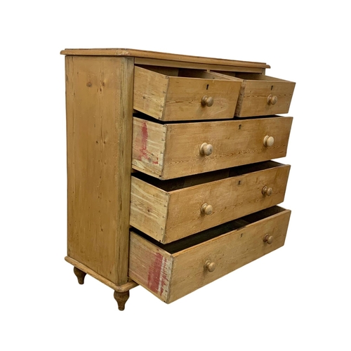 809 - A tall Victorian pine chest of drawers, 105cm x 43cm x 101cm