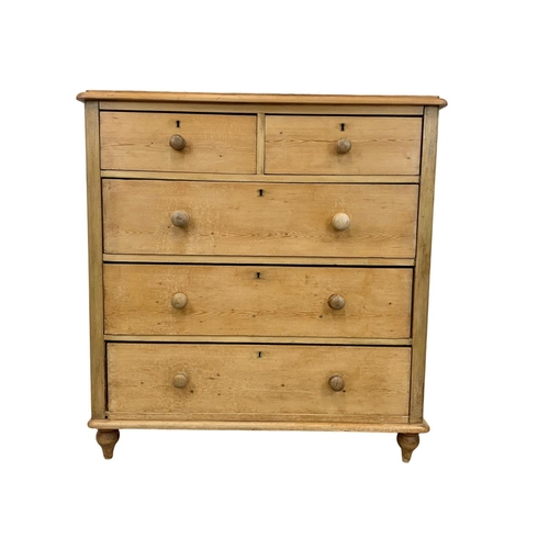 809 - A tall Victorian pine chest of drawers, 105cm x 43cm x 101cm