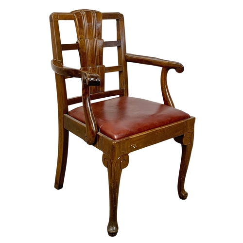 812 - A 1930s armchair with leather seat