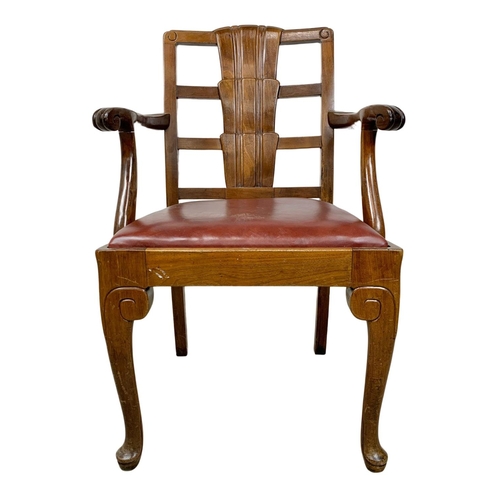 812 - A 1930s armchair with leather seat