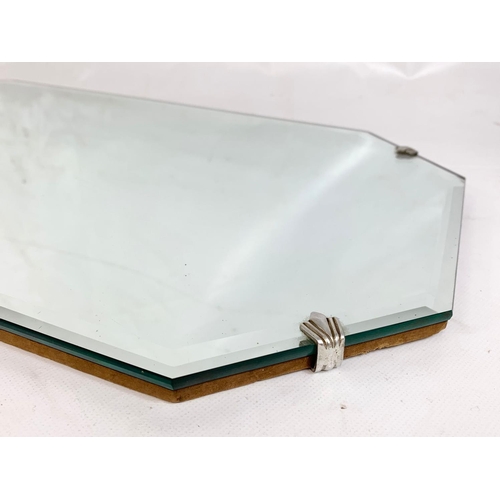 98 - A vintage bevelled mirror, 56cm x 33cm