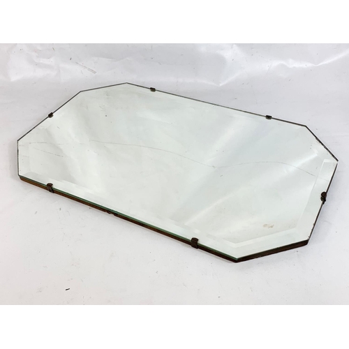 99 - A vintage bevelled mirror, 54cm x 34cm