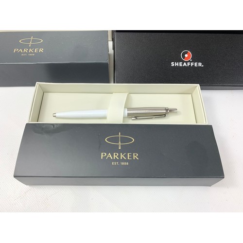 696 - 2 Parker pens and a Sheaffer pen and other