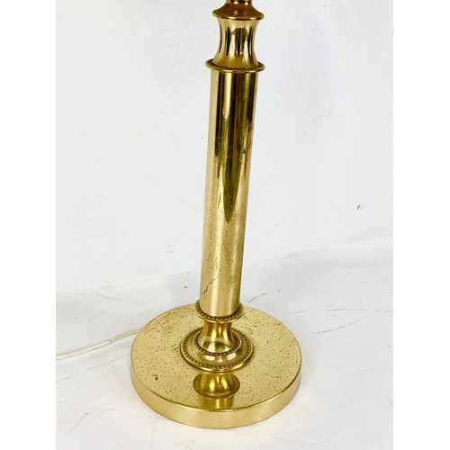 389b - A large brass lamp, 83cm