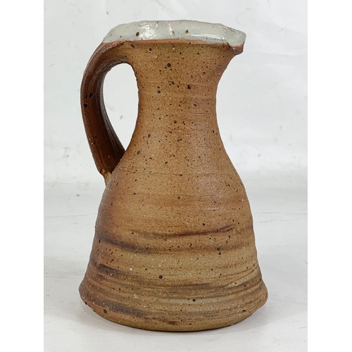 630 - A quality Jean Linard stoneware jug, Signed. 19cm