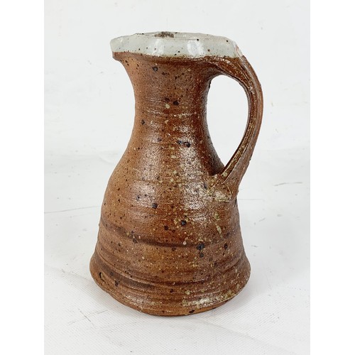 630 - A quality Jean Linard stoneware jug, Signed. 19cm