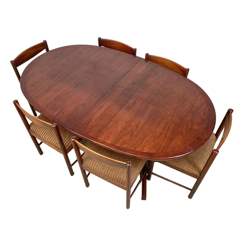 804 - A McIntosh rosewood dining table and 6 chairs, 177cm x 109.5cm x 71.5cm