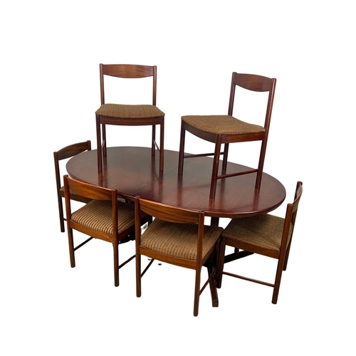 804 - A McIntosh rosewood dining table and 6 chairs, 177cm x 109.5cm x 71.5cm