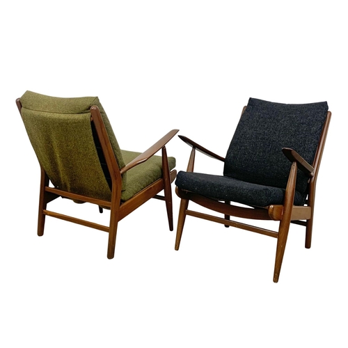 805 - A pair of Danish style teak armchairs by Scandart circa 1960's