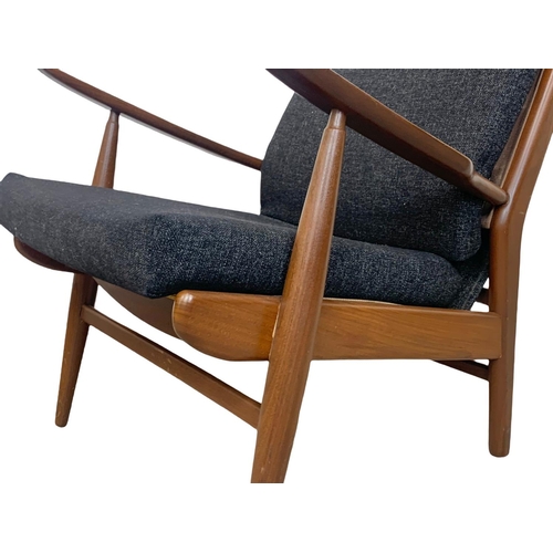 805 - A pair of Danish style teak armchairs by Scandart circa 1960's