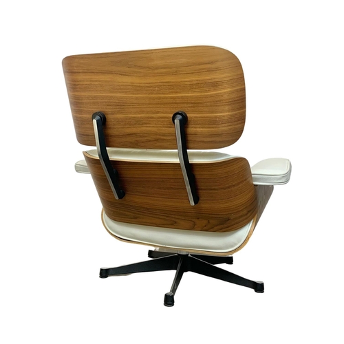 806 - A Charles & Ray Eames style armchair with matching stool