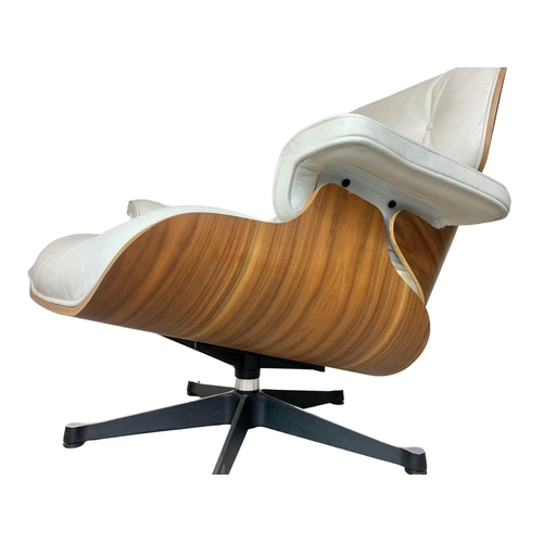 806 - A Charles & Ray Eames style armchair with matching stool