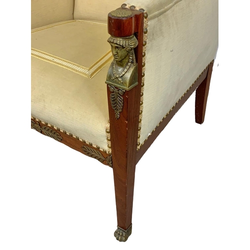 807 - A large Egyptian revival Regency style armchair with brass ormolu mounts