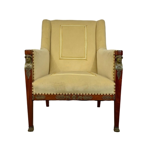 807 - A large Egyptian revival Regency style armchair with brass ormolu mounts