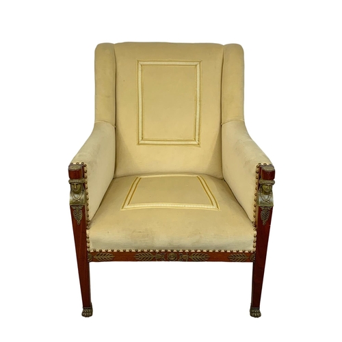 807 - A large Egyptian revival Regency style armchair with brass ormolu mounts