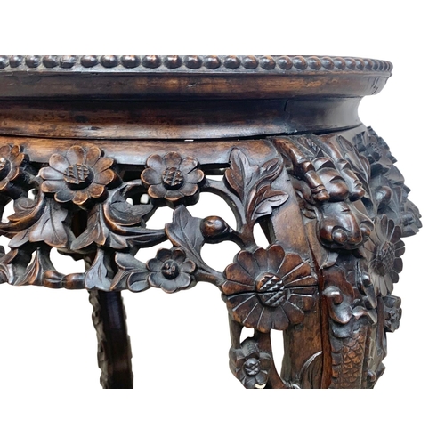 809 - A late 19th century carved padauk marble top side table, 50cm x 57cm