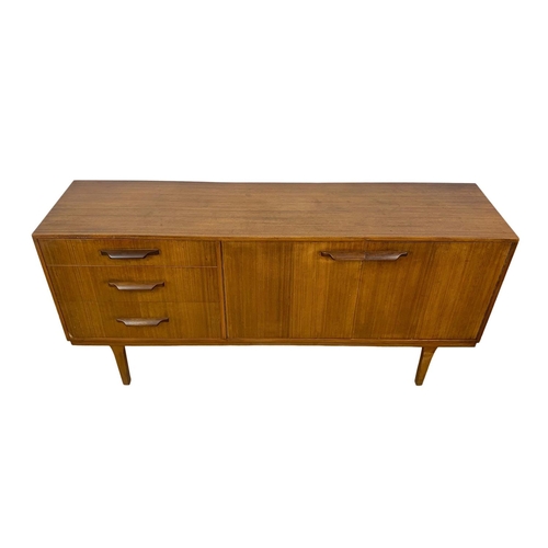 868 - A teak mid century sideboard, 167cm x 43cm x 79cm