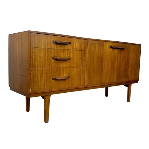 868 - A teak mid century sideboard, 167cm x 43cm x 79cm