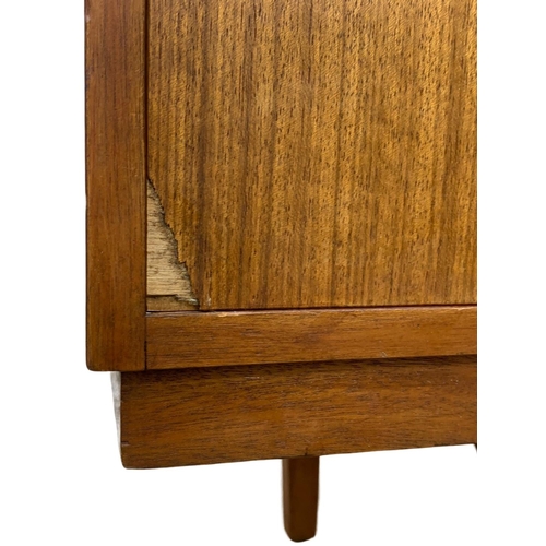 868 - A teak mid century sideboard, 167cm x 43cm x 79cm