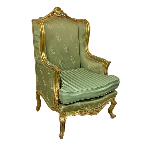 921 - A pair of large vintage 18th century style gilded chateau armchairs.