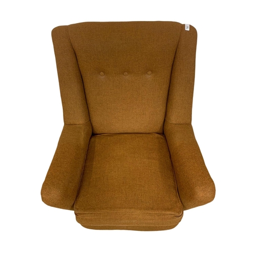 950 - A neat sized Mid Century armchair circa 1960's. 76cm x 85cm x 85cm