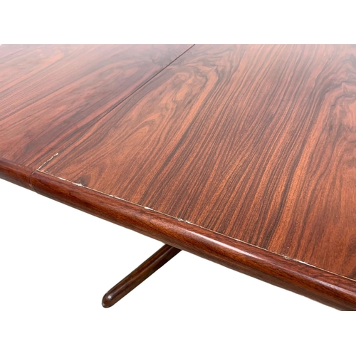 951 - A Danish rosewood two leaf dining table by Rasmus, 150cm x 100cm x 74cm. Not extended