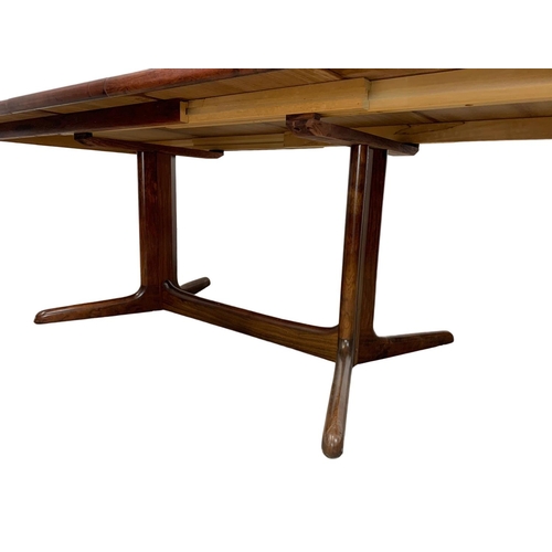 951 - A Danish rosewood two leaf dining table by Rasmus, 150cm x 100cm x 74cm. Not extended