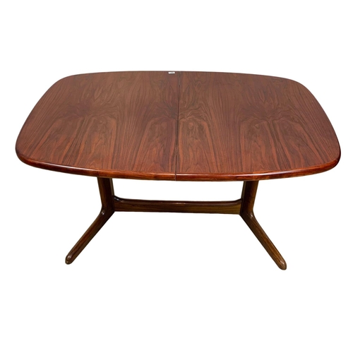 951 - A Danish rosewood two leaf dining table by Rasmus, 150cm x 100cm x 74cm. Not extended