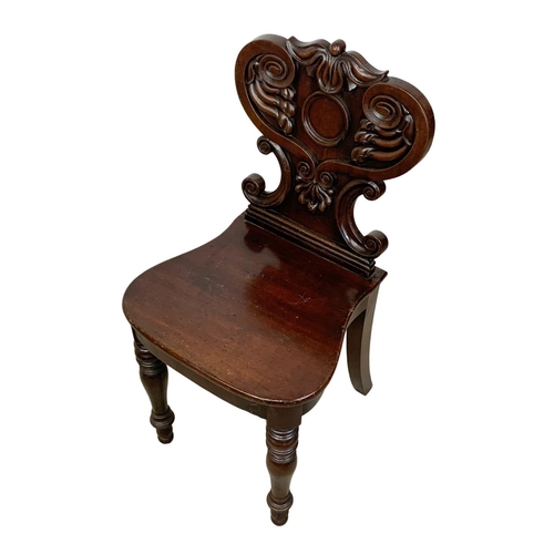 954 - A William IV mahogany hall chair.  Circa 1835.