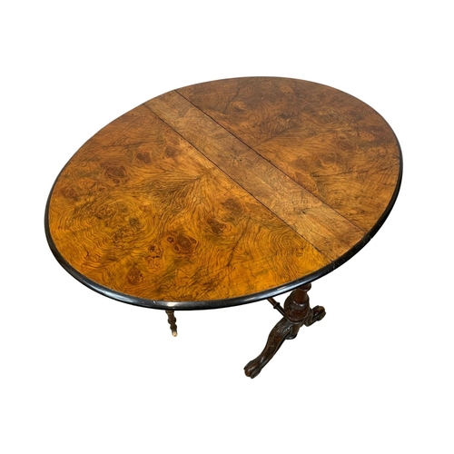 955 - A Victorian burr walnut Sutherland table.  89.5x15.5x71cm closed.