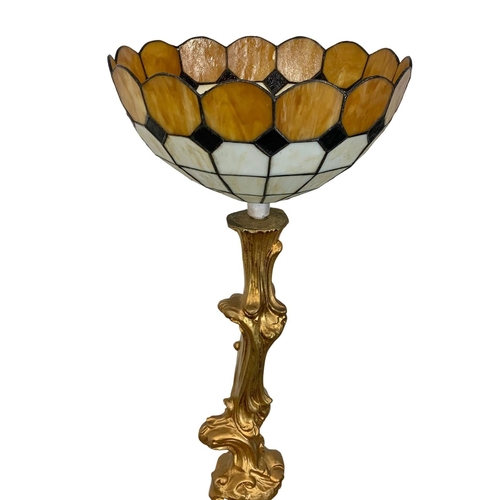 883b - A tall ornate gilt floor lamp with a Tiffany style shade. 173cm