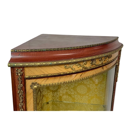 852a - An 18th century style French corner Vitrine with brass ormolu mounts. 63x42x167.5cm