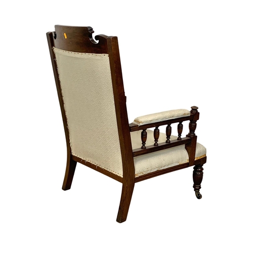 956 - A large Edwardian walnut gent's chair.