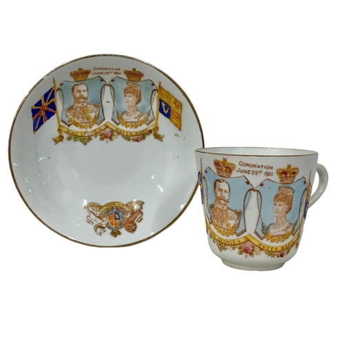 624 - A set of 4 cups and saucers. George V Coronation 1911.