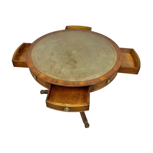 1029E - A Georgian style mahogany drum table with leather top, 90cm x 71cm