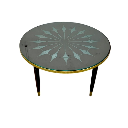 988a - A mid century coffee table. 71x42cm