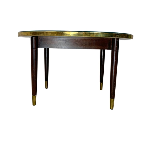 988a - A mid century coffee table. 71x42cm