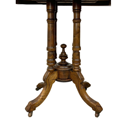 1046a - A Victorian mahogany inlaid pedestal table.  88x53x71cm