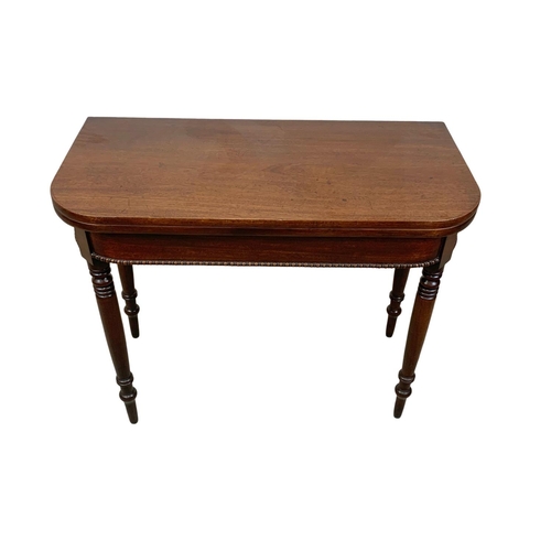 1063 - A Victorian mahogany tea table. 91x45x74cm