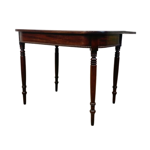 1063 - A Victorian mahogany tea table. 91x45x74cm